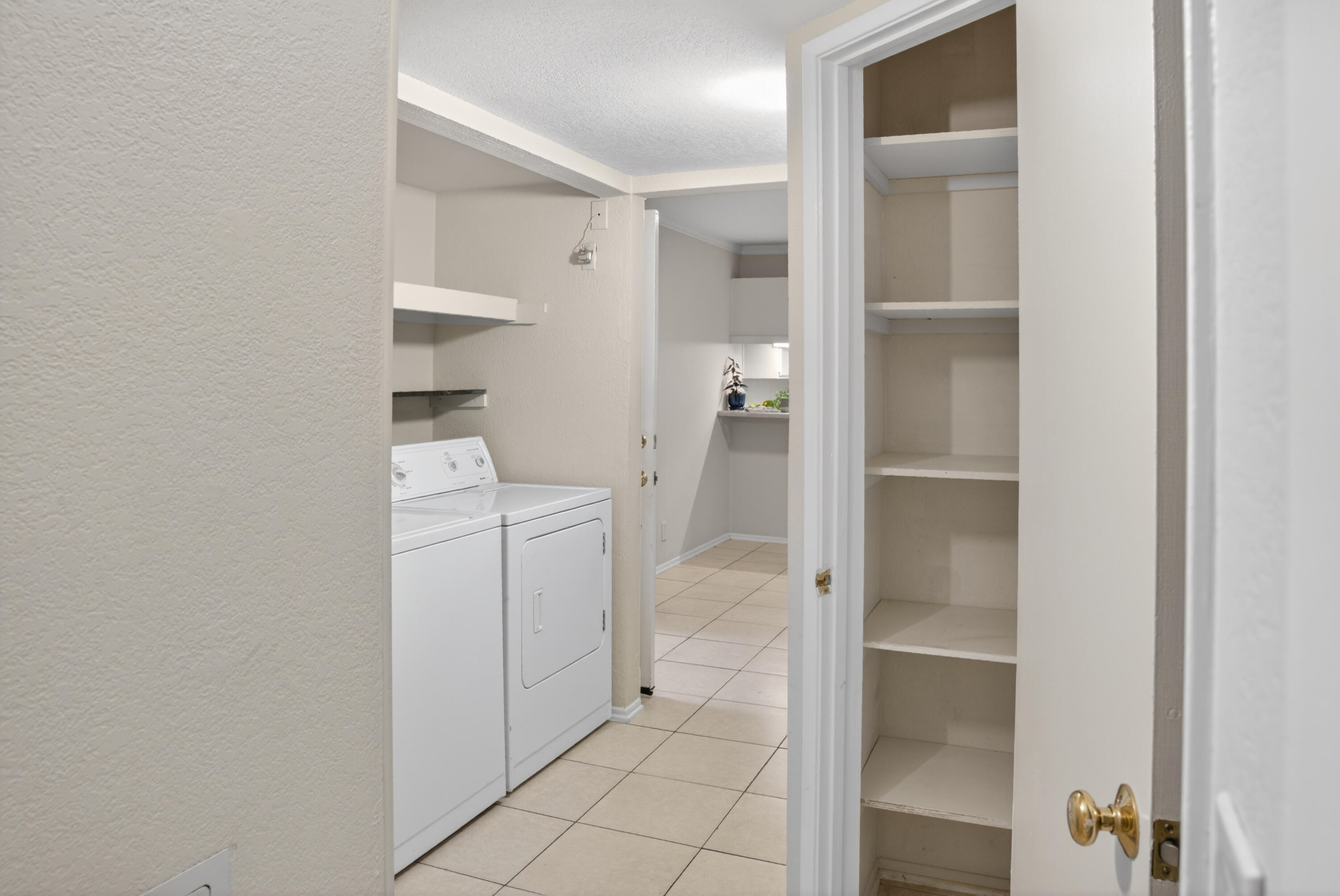 521 West Montecito Street, Unit 1 Santa Barbara, CA 93101 - Photo 18 of 36 a room with a closet and utility room