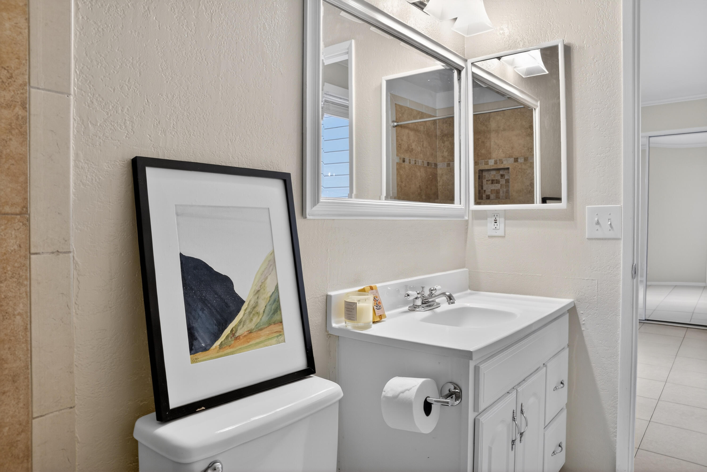 521 West Montecito Street, Unit 1 Santa Barbara, CA 93101 - Photo 22 of 36 a bathroom with a sink and a mirror