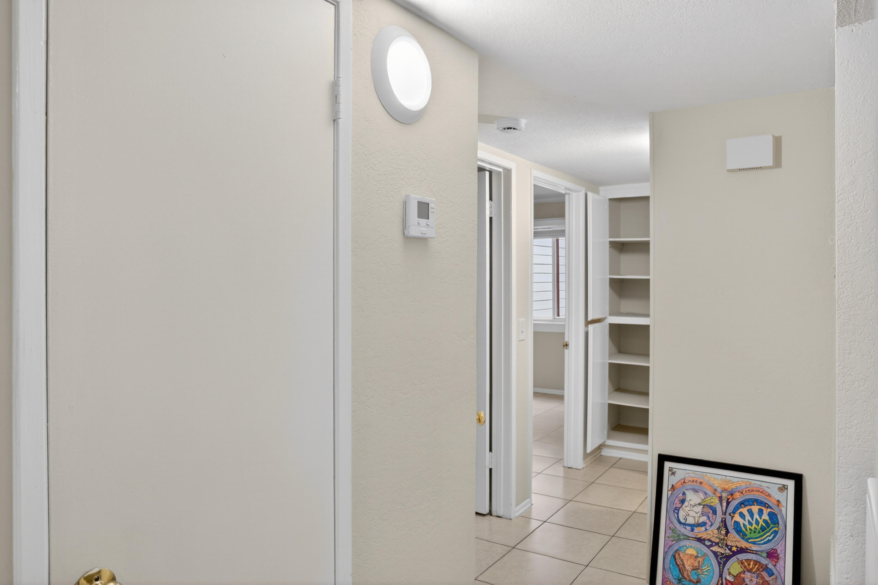 521 West Montecito Street, Unit 1 Santa Barbara, CA 93101 - Photo 25 of 36 a view of a hallway with closet