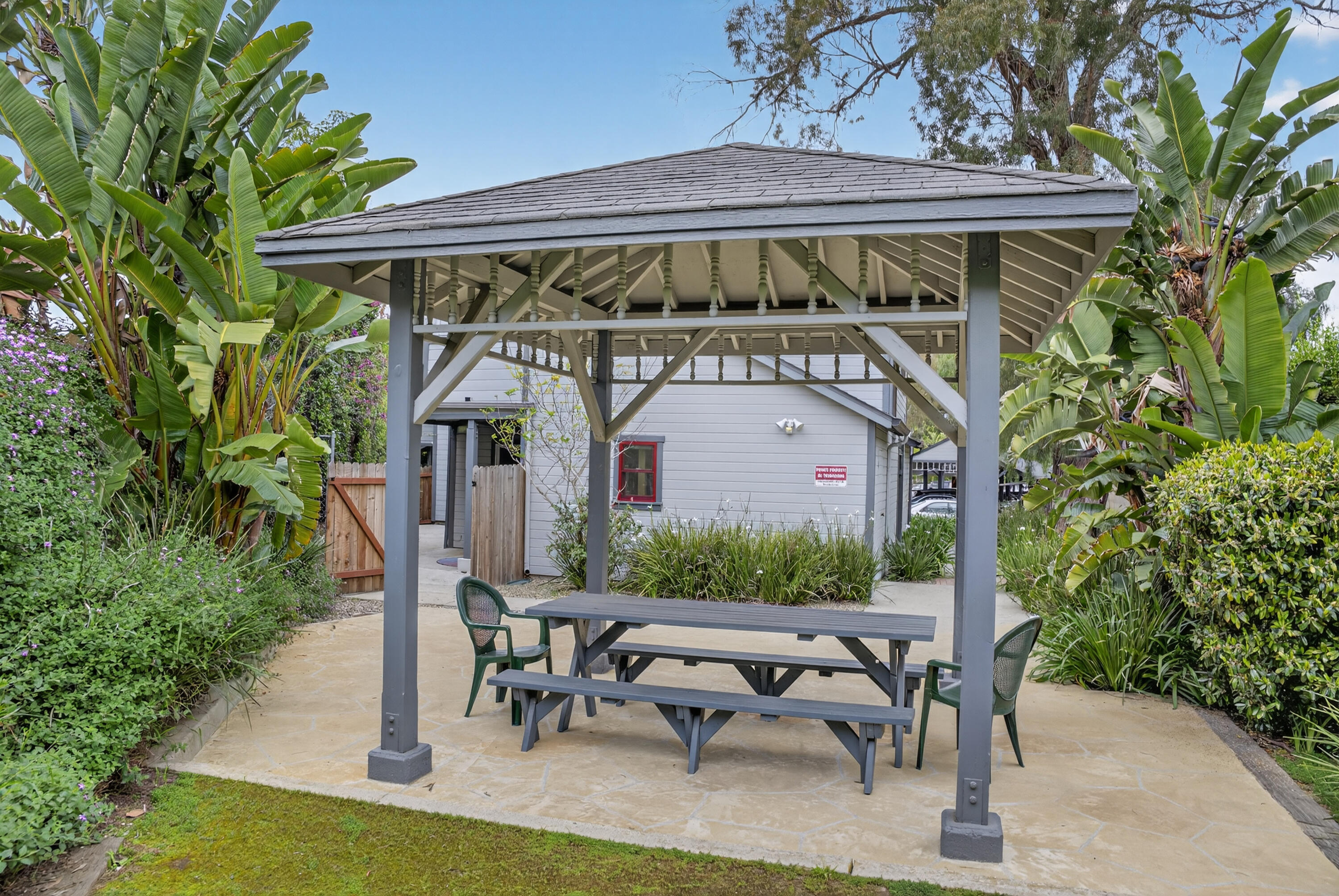 521 West Montecito Street, Unit 1 Santa Barbara, CA 93101 - Photo 28 of 36 a view of a dinning table and chairs in patio