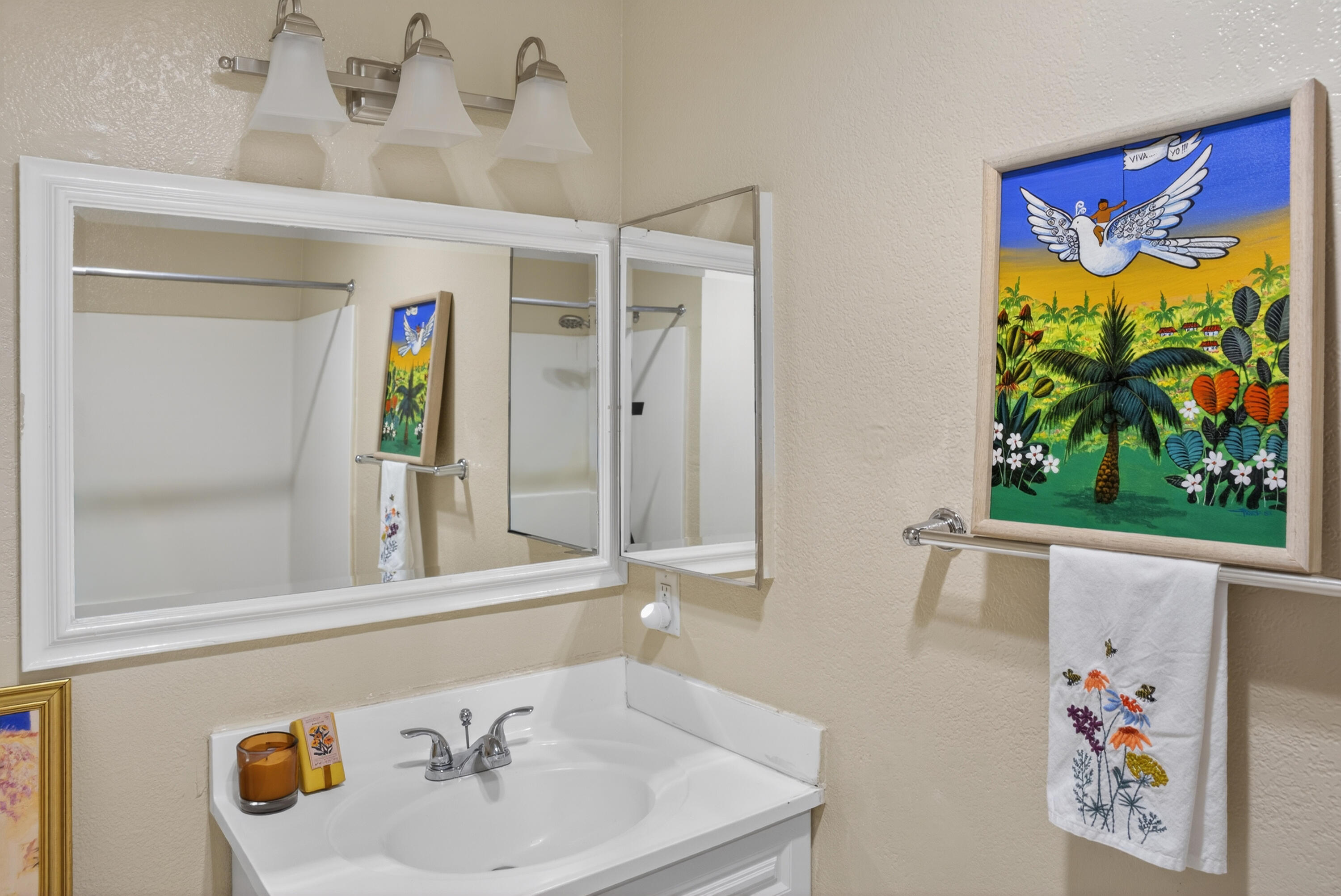 521 West Montecito Street, Unit 1 Santa Barbara, CA 93101 - Photo 6 of 36 a bathroom with a sink and a mirror