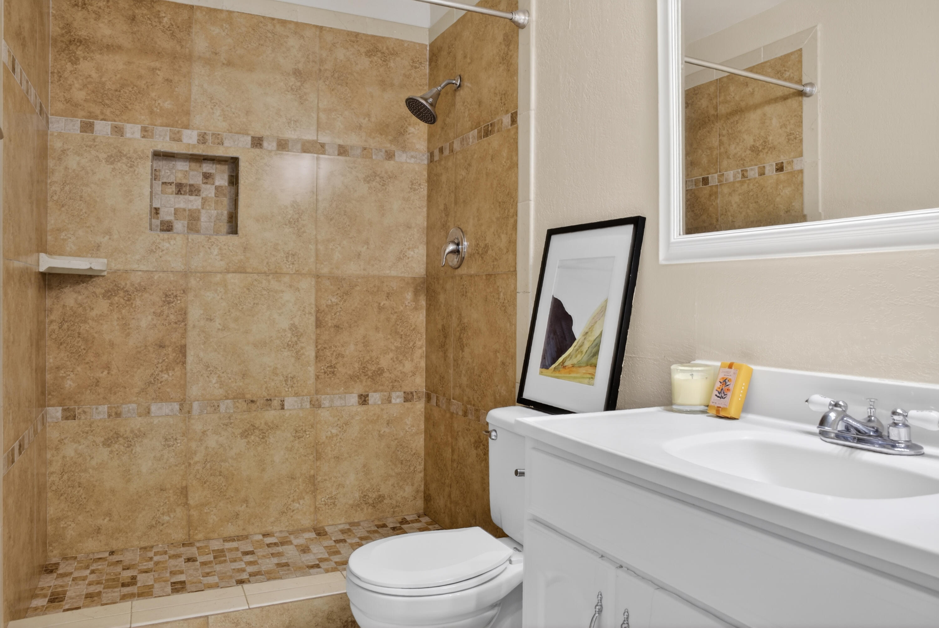 521 West Montecito Street, Unit 1 Santa Barbara, CA 93101 - Photo 8 of 36 a bathroom with a sink toilet and shower