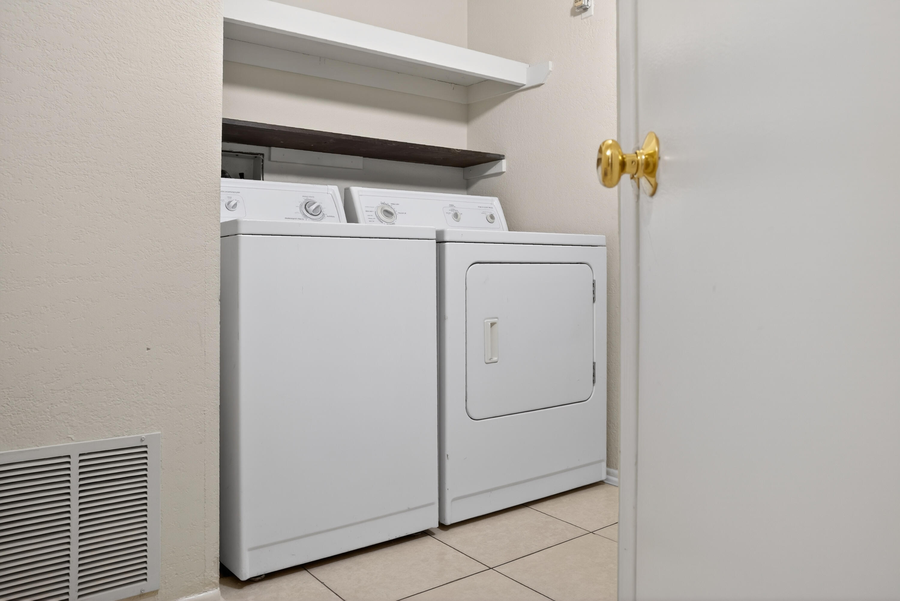 521 West Montecito Street, Unit 1 Santa Barbara, CA 93101 - Photo 10 of 36 a utility room with dryer and washer