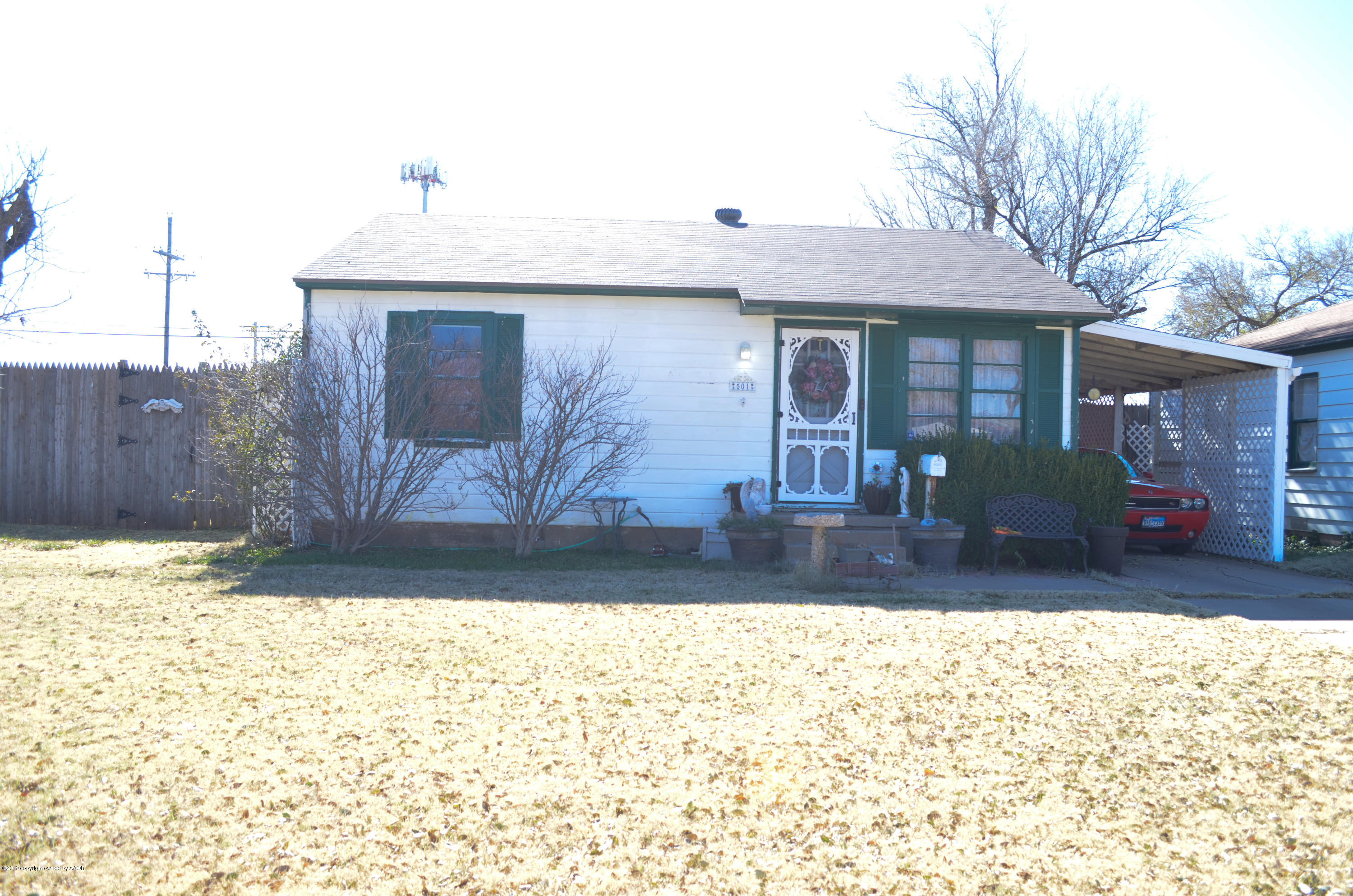 501 Southwest 45th Avenue Amarillo, TX 79110 - Photo 1 of 14 a view of a house with a yard