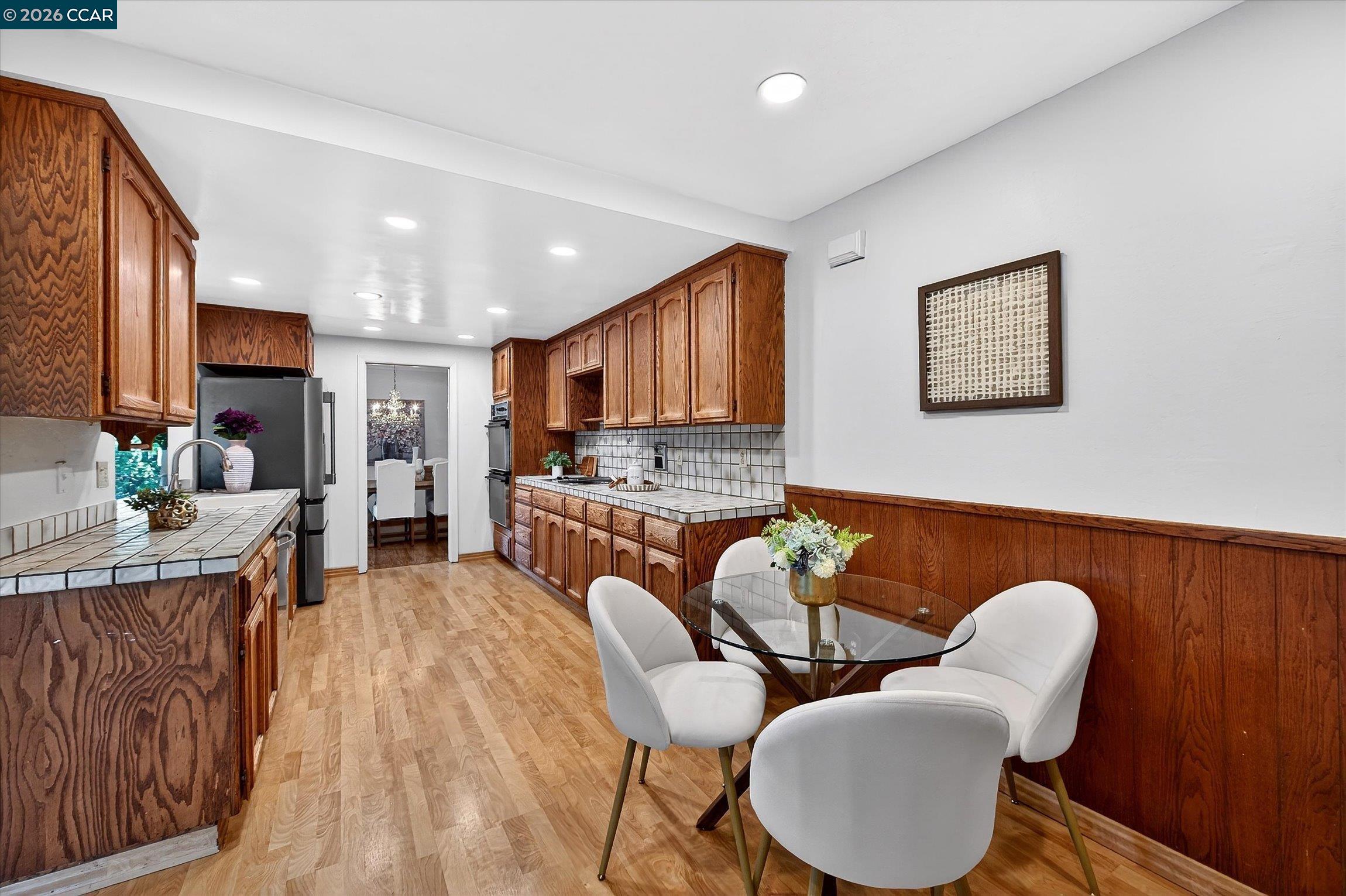 27 Milburn Court San Ramon, CA 94583 - Photo 14 of 41 a living room with furniture kitchen view and a large window
