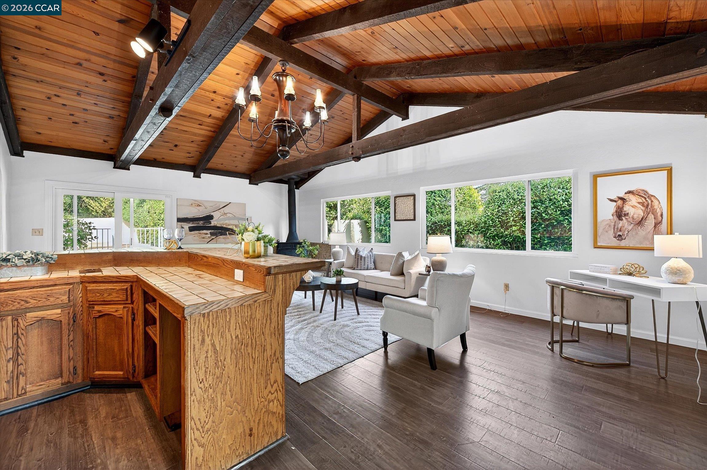 27 Milburn Court San Ramon, CA 94583 - Photo 19 of 41 a view of a kitchen with furniture and wooden floor