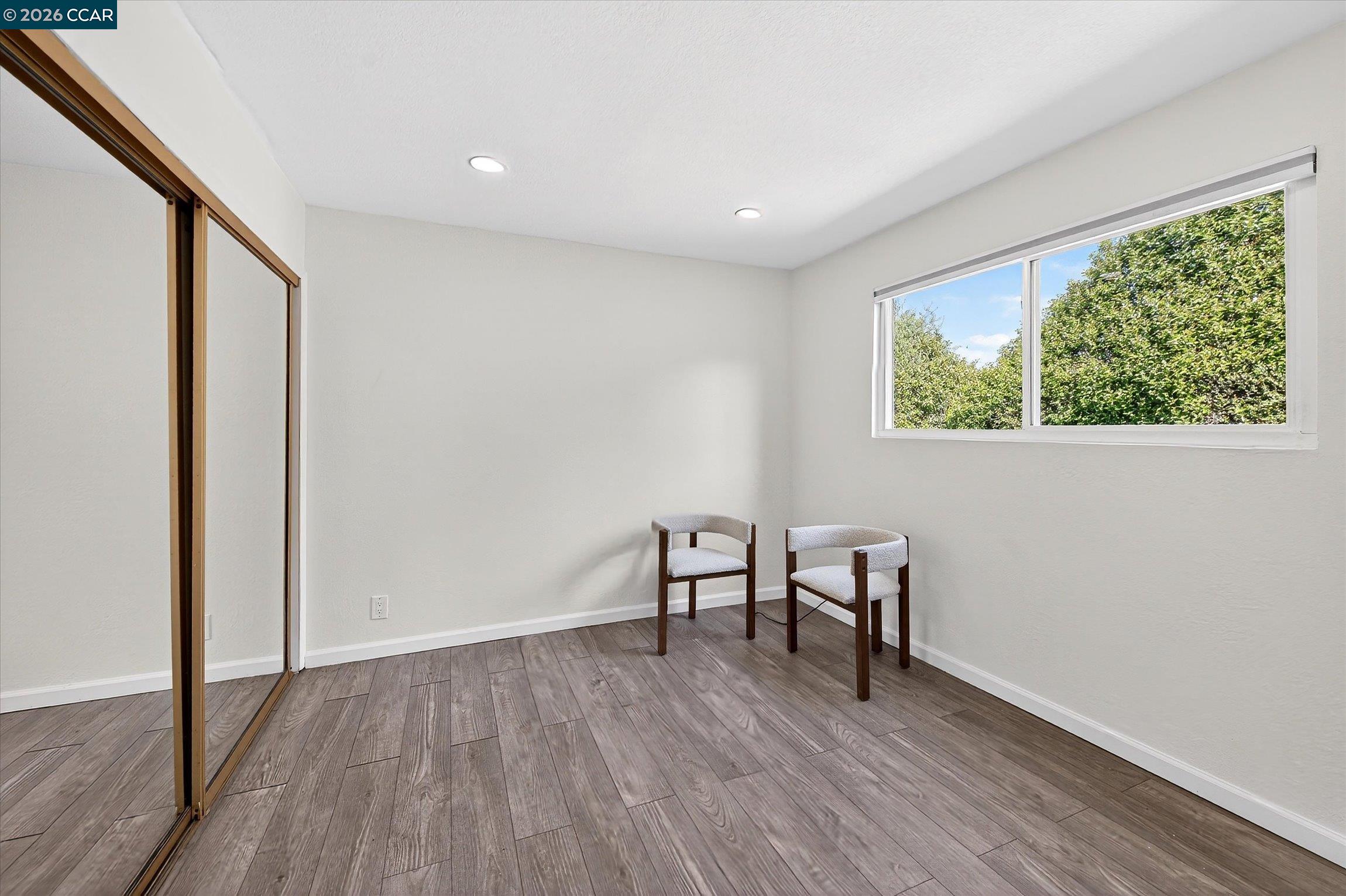 27 Milburn Court San Ramon, CA 94583 - Photo 29 of 41 a view of a livingroom with furniture and wooden floor