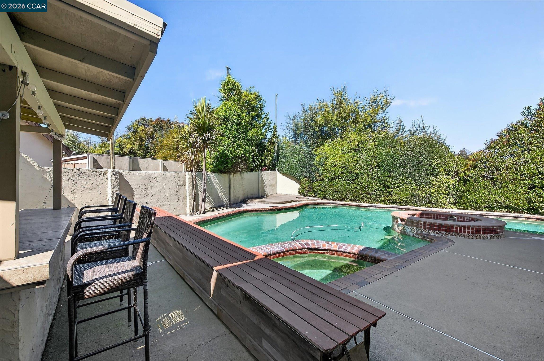 27 Milburn Court San Ramon, CA 94583 - Photo 33 of 41 a view of a backyard with sitting area