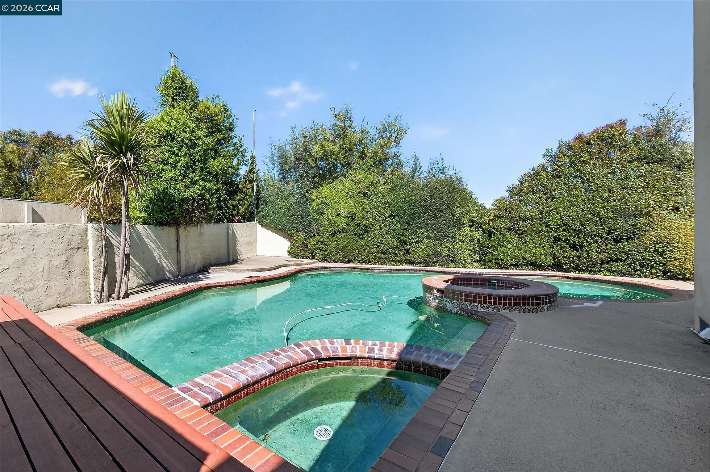 27 Milburn Court San Ramon, CA 94583 - Photo 36 of 41 a view of a backyard with sitting area