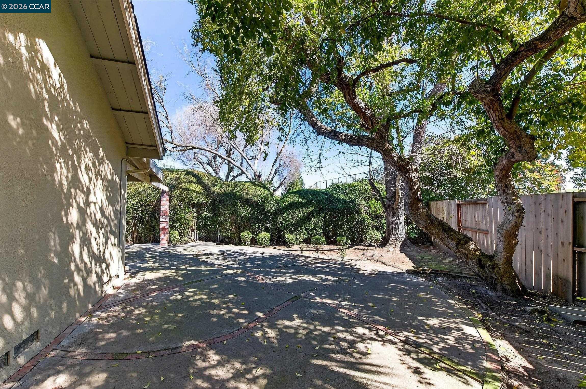 27 Milburn Court San Ramon, CA 94583 - Photo 39 of 41 a view of a backyard with large trees