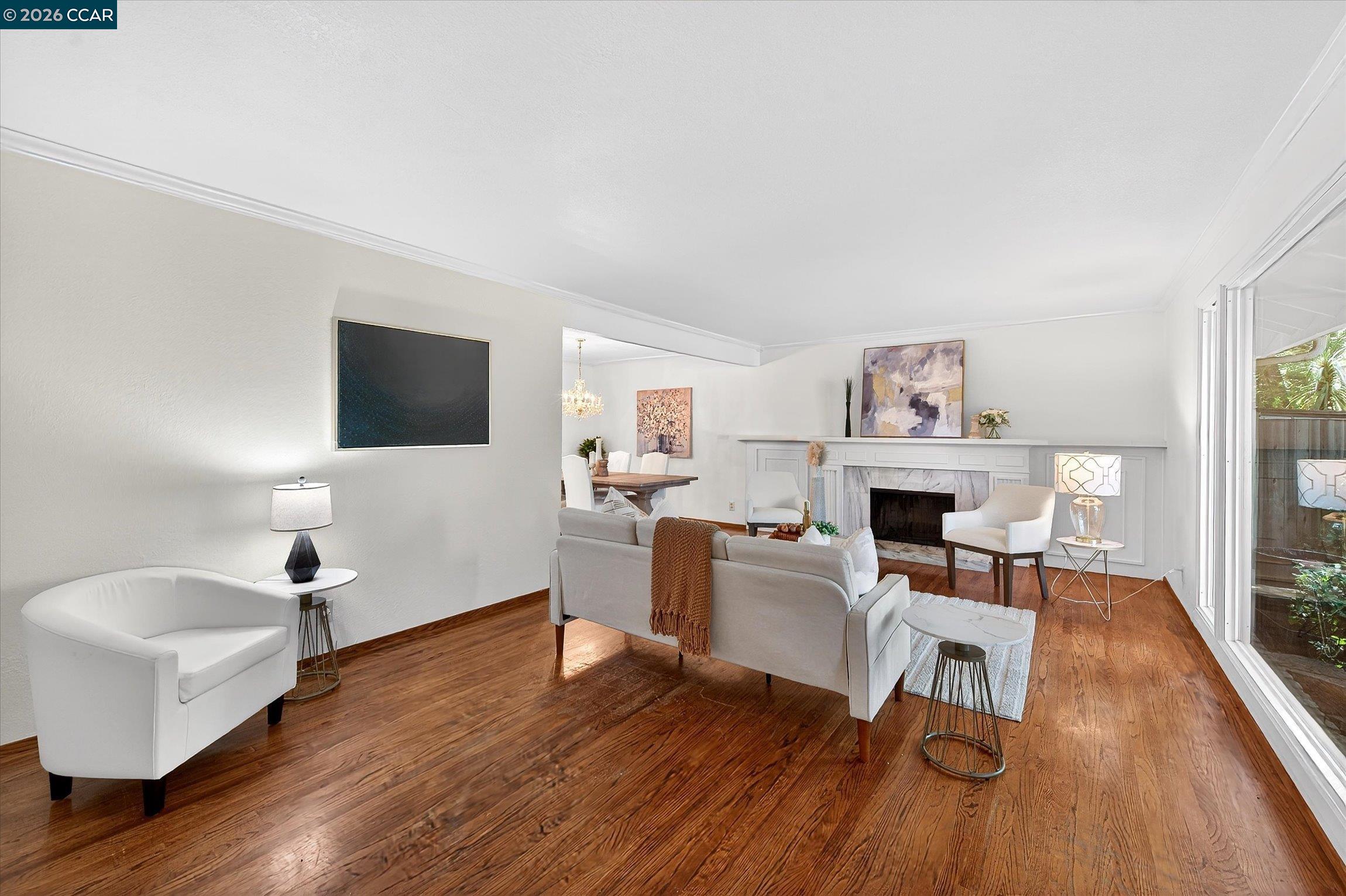 27 Milburn Court San Ramon, CA 94583 - Photo 6 of 41 a living room with furniture and a flat screen tv