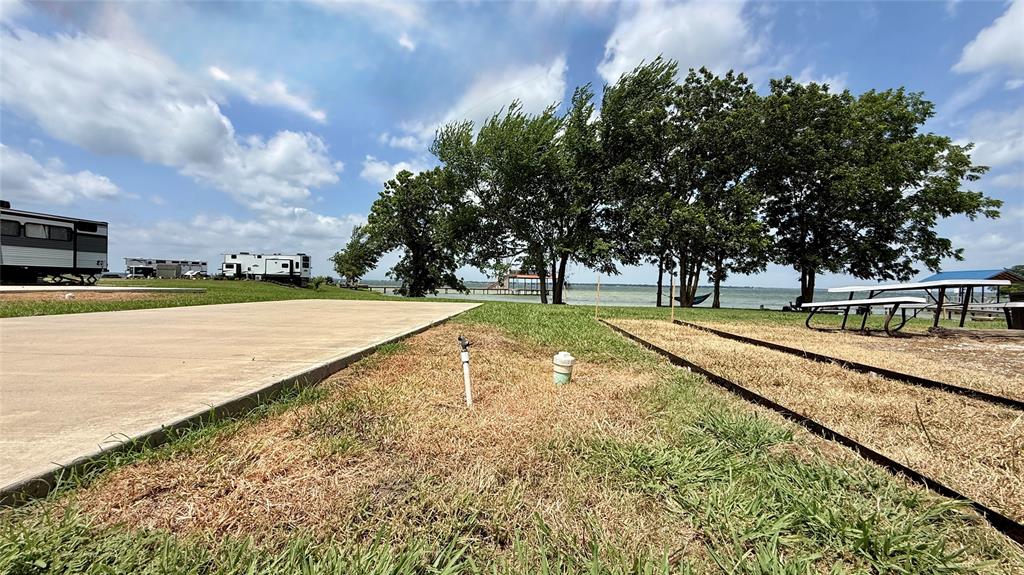 5136 Peninsula Road Kerens, TX 75144 - Photo 9 of 40 RV pad and shoreline setting in Peninsula Point.