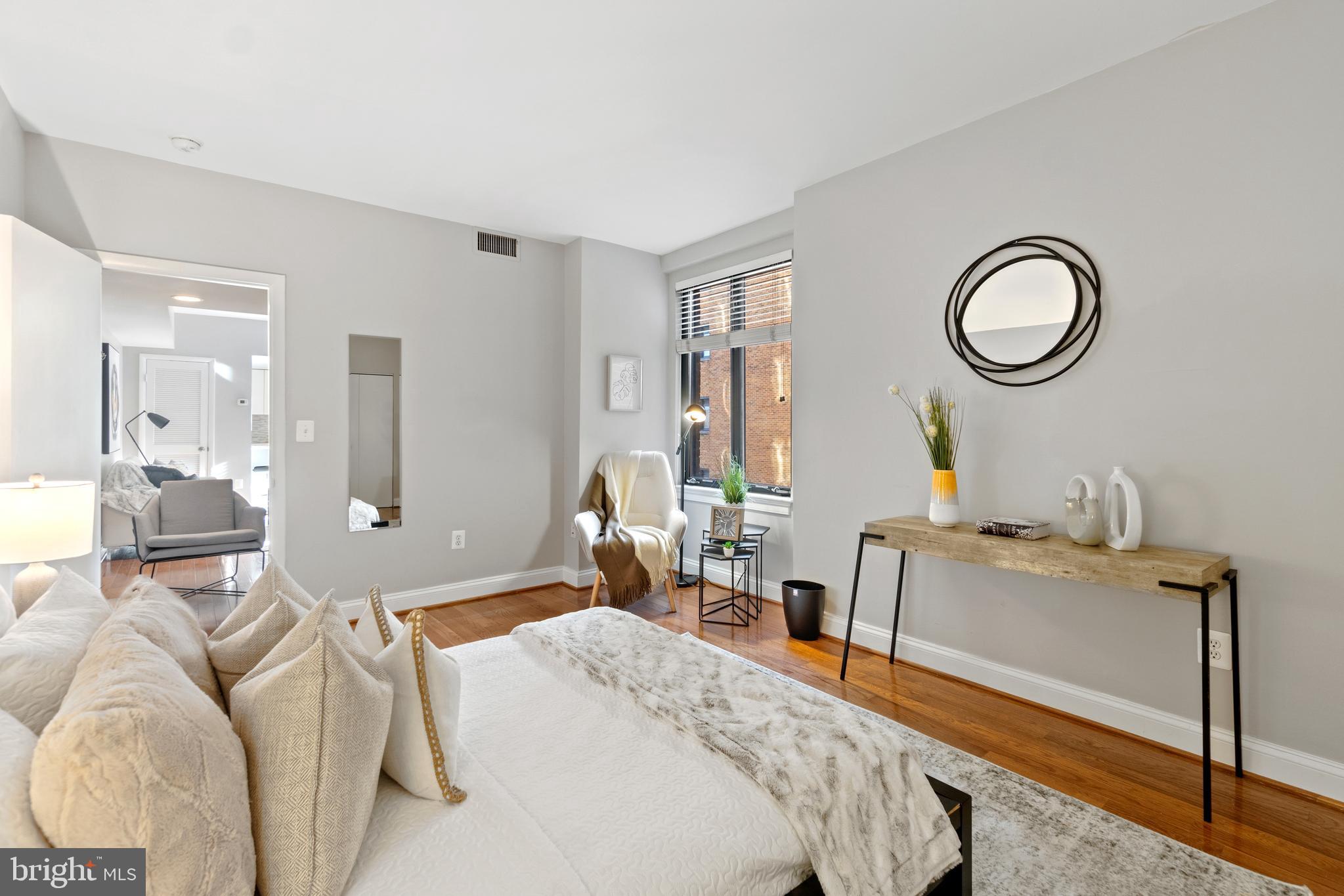 1701 16th Street Northwest, Unit 421 Washington, DC 20009 - Photo 15 of 20 a bedroom with bed and a window
