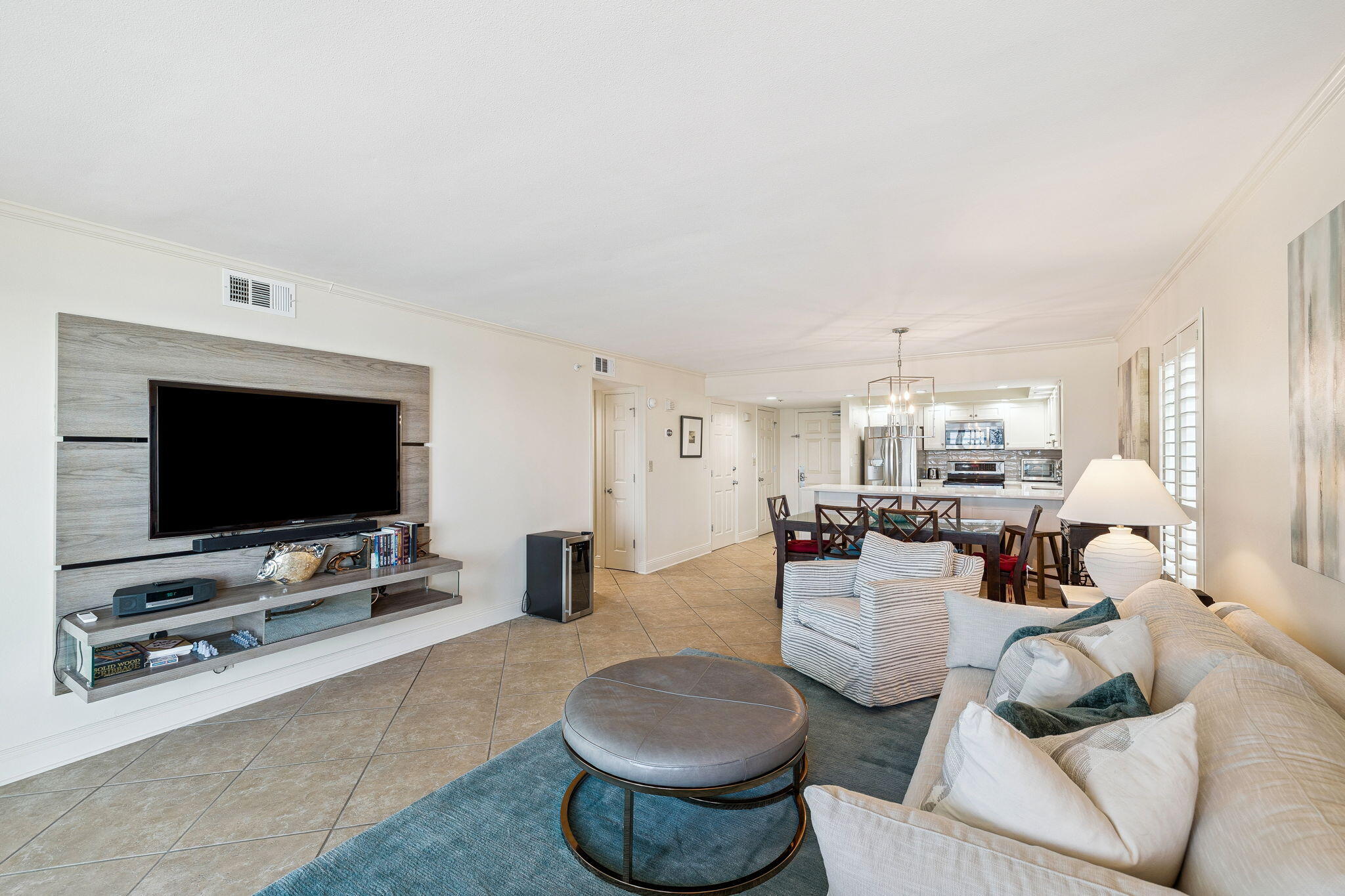 4253 Beachside 2, Unit 4253 Miramar Beach, FL 32550 - Photo 17 of 92 a living room with furniture and a flat screen tv
