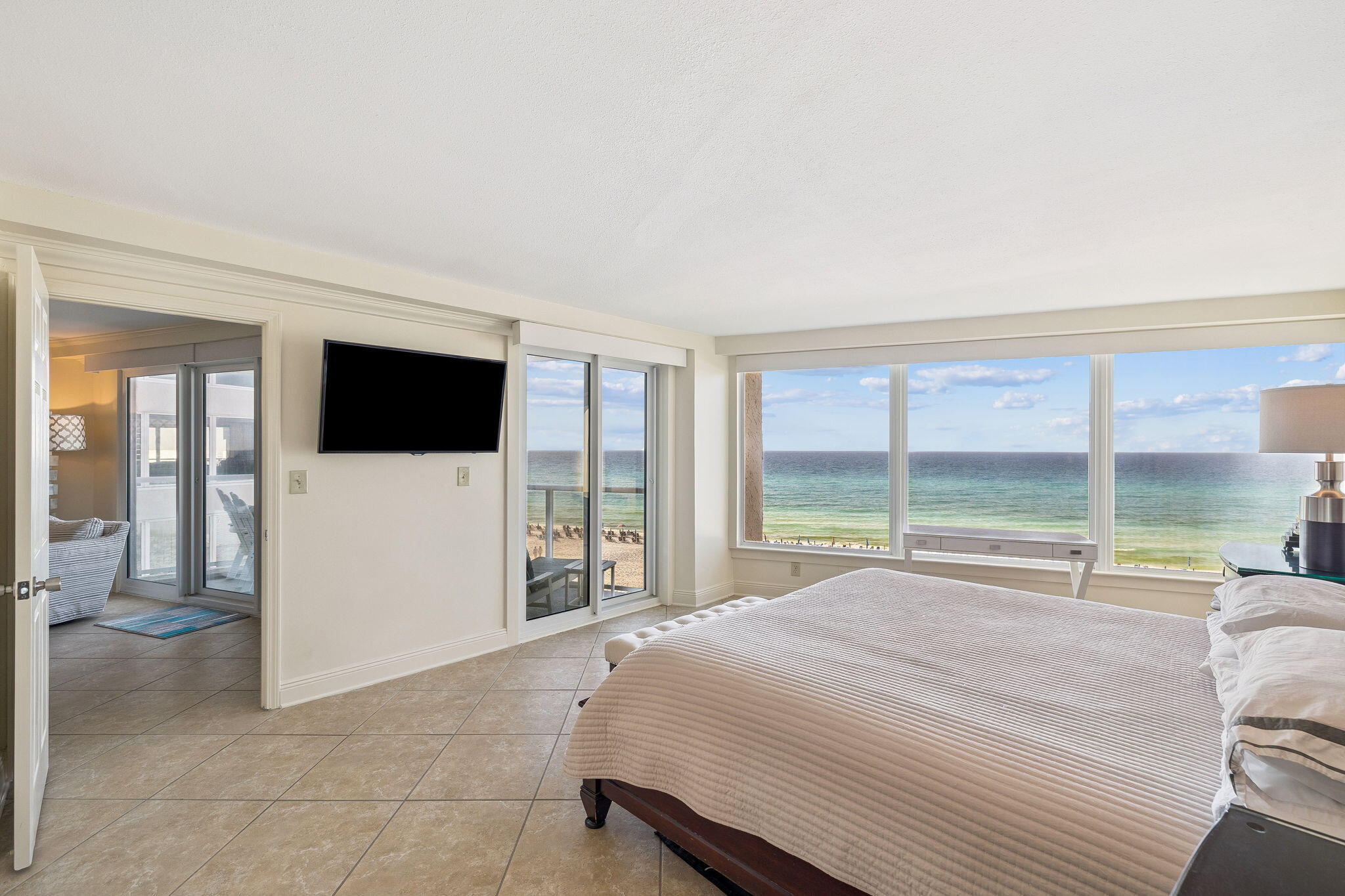 4253 Beachside 2, Unit 4253 Miramar Beach, FL 32550 - Photo 25 of 92 a bedroom with a bed and a large window with outer view