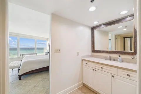 a view of a swimming pool and an outdoor space