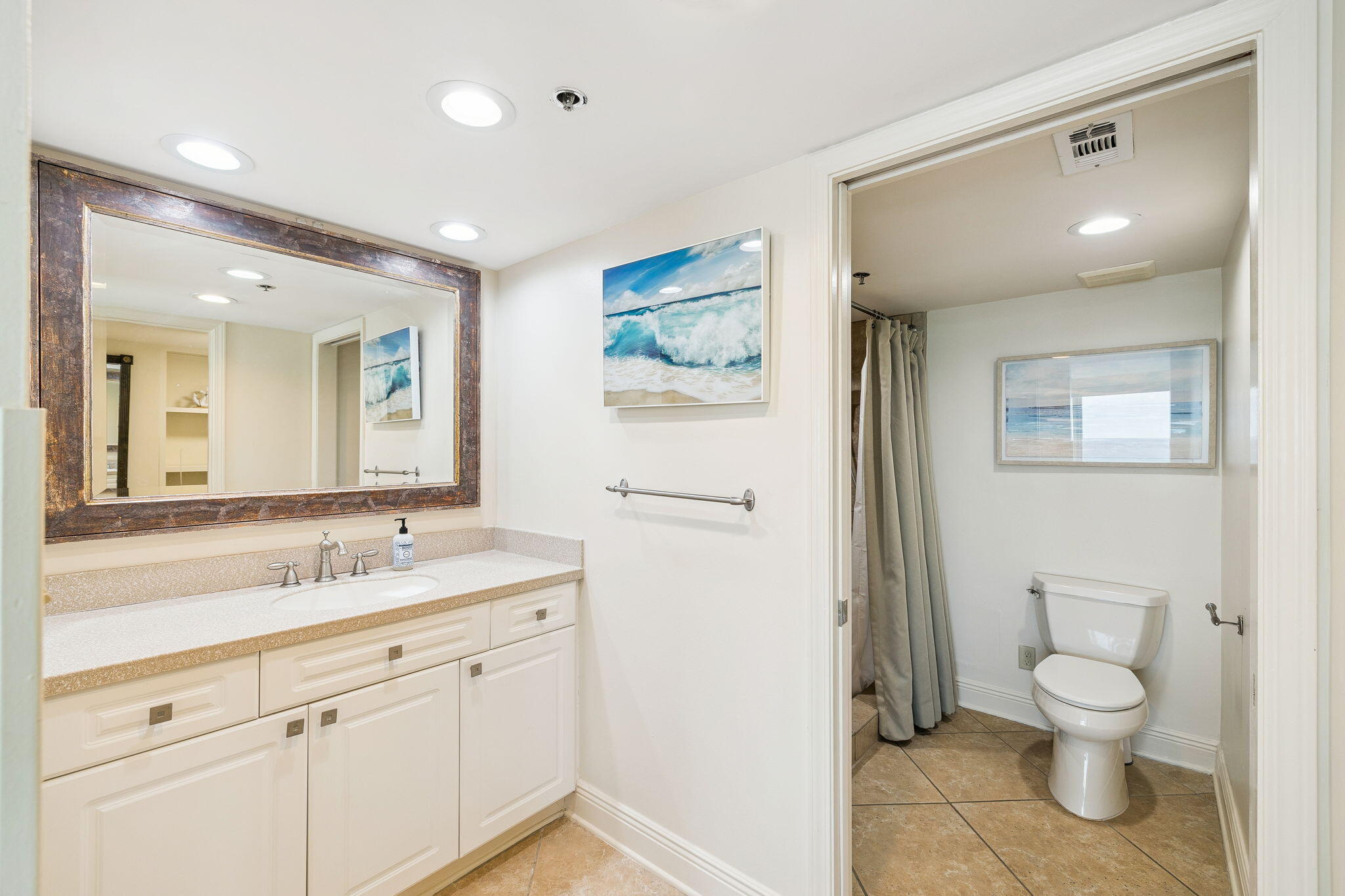 4253 Beachside 2, Unit 4253 Miramar Beach, FL 32550 - Photo 28 of 92 a spacious bathroom with a granite countertop sink mirror and toilet