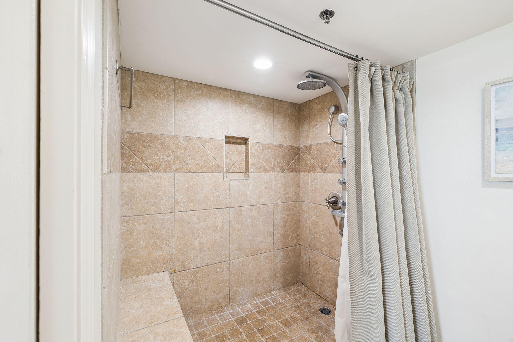 4253 Beachside 2, Unit 4253 Miramar Beach, FL 32550 - Photo 29 of 92 a bathroom with a shower and a glass door