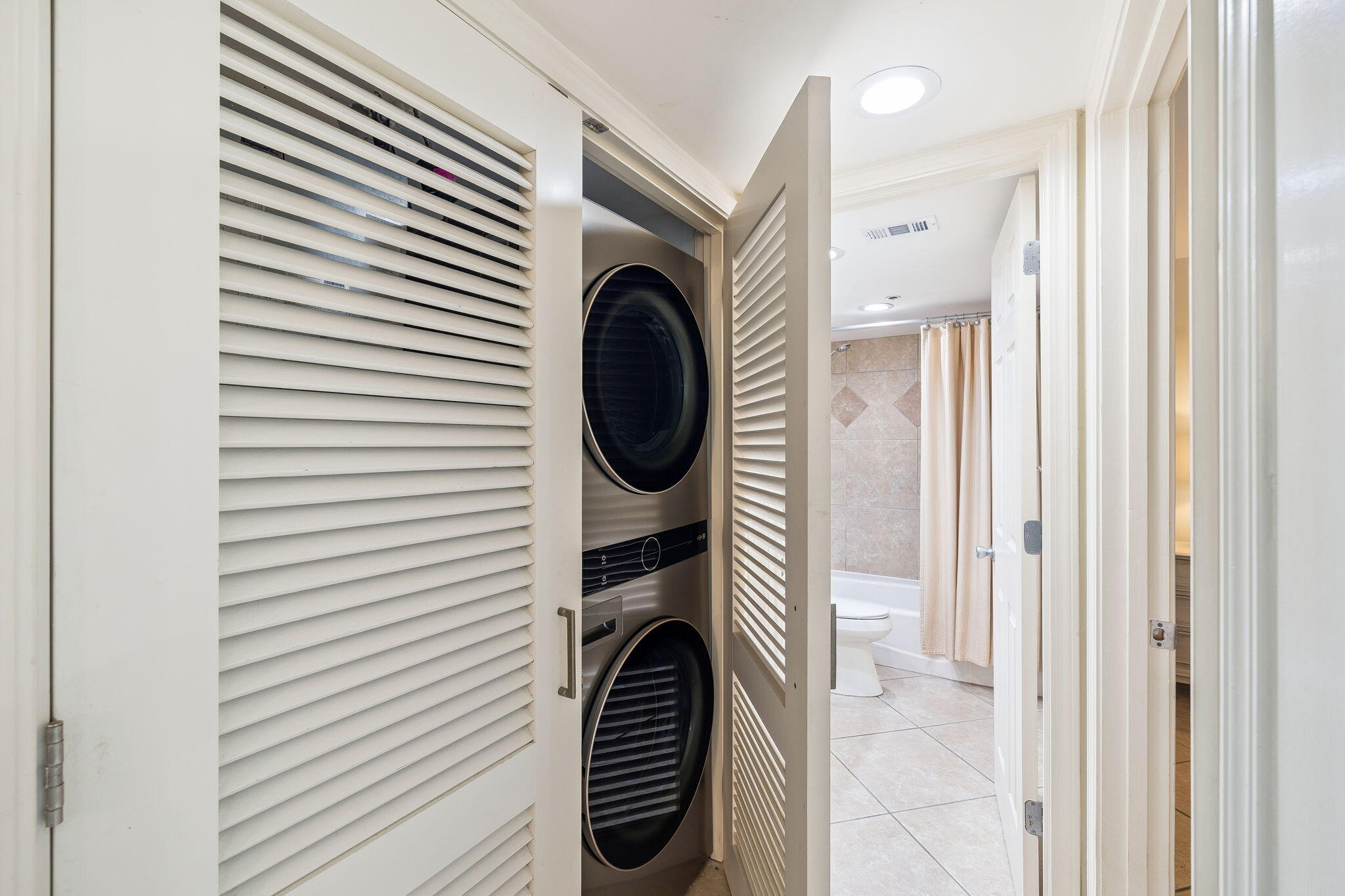 4253 Beachside 2, Unit 4253 Miramar Beach, FL 32550 - Photo 33 of 92 a close view of a utility room with washer and dryer