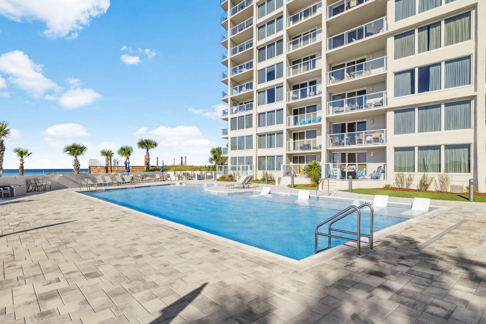 4253 Beachside 2, Unit 4253 Miramar Beach, FL 32550 - Photo 35 of 92 a view of swimming pool with outdoor seating