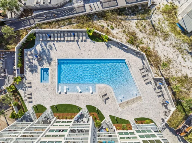 a view of fountain with tree in the background