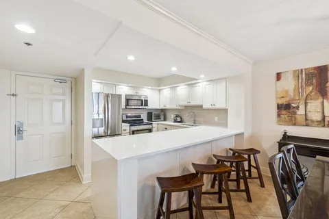 a bathroom with a bathtub and a sink