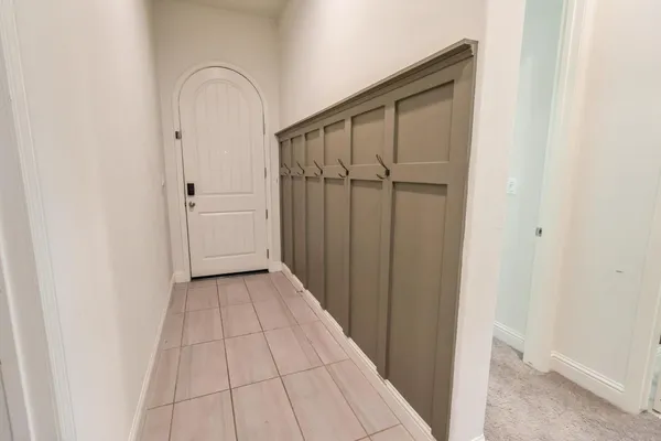 a kitchen with stainless steel appliances kitchen island granite countertop a refrigerator a sink a stove a microwave and island