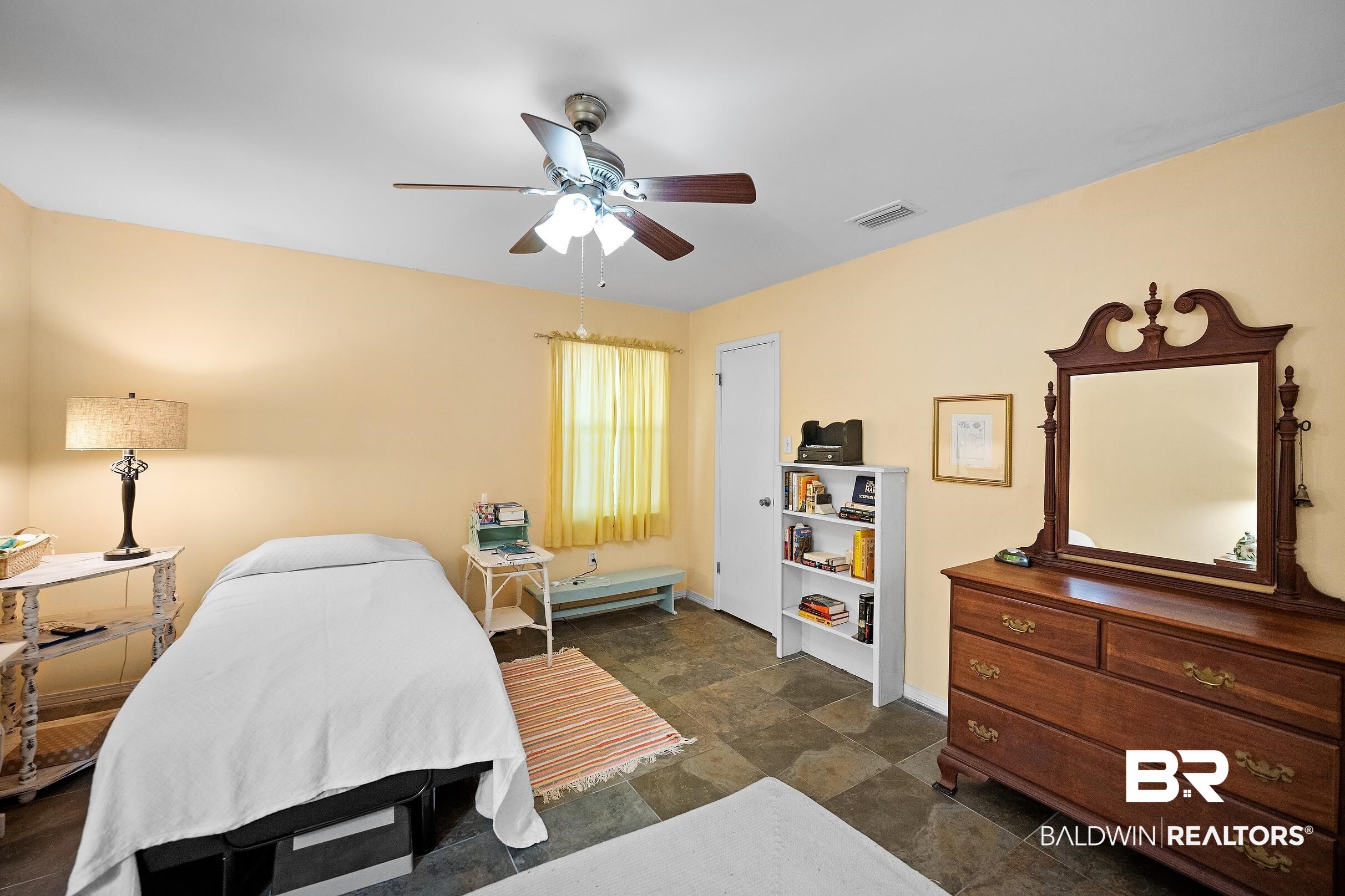 4026 Kingsrow Row Mobile, AL 36619 - Photo 31 of 51 Bedroom with stone finish flooring and a ceiling fan