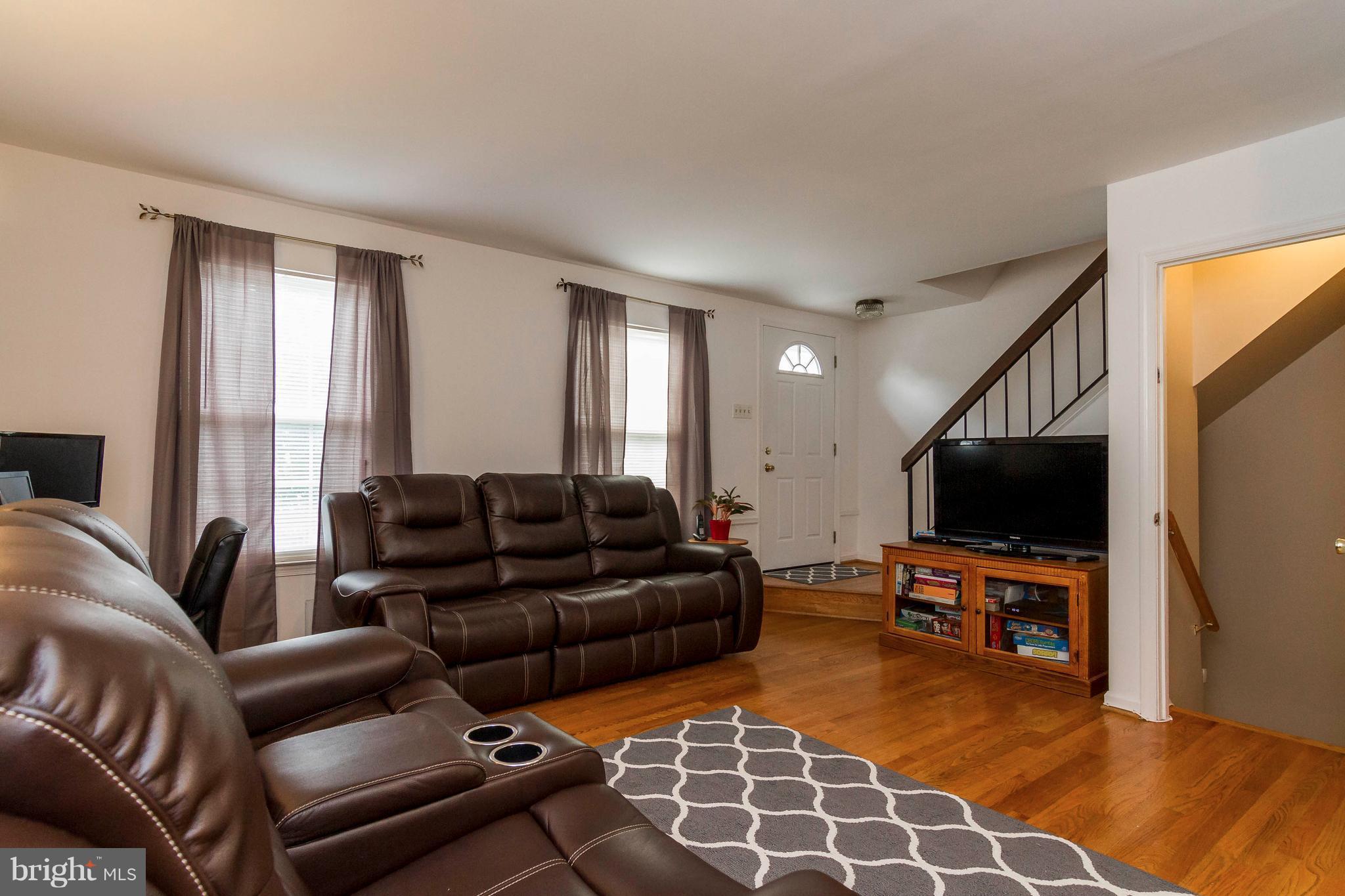 8338 Snowden Oaks Place Laurel, MD 20708 - Photo 3 of 23 Family Room/Living Room