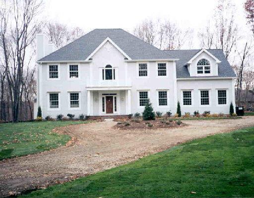 181 Haviland Road Stamford, CT 06903 - Photo 1 of 1 a view of a yard in front of a house with a large tree