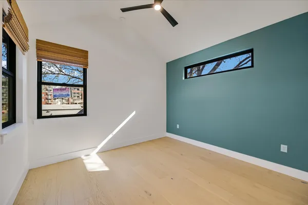a view of a hallway with stairs
