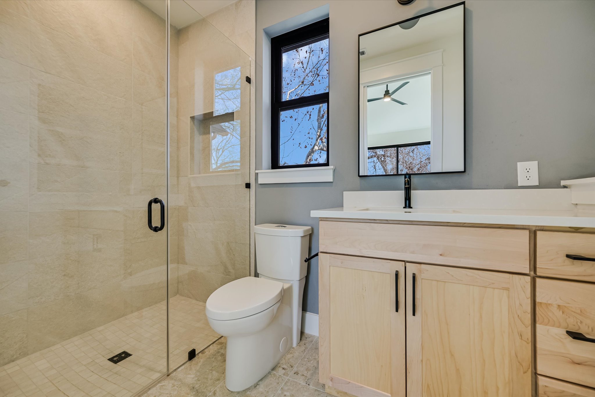 3503 Kay Street, Unit 2 Austin, TX 78702 - Photo 16 of 19 a bathroom with a sink toilet and shower