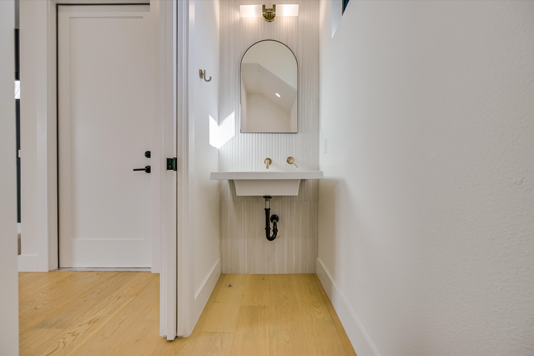 3503 Kay Street, Unit 2 Austin, TX 78702 - Photo 10 of 19 a bathroom with a sink and mirror