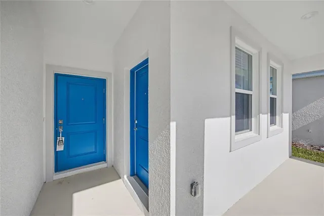 a view of hallway with livingroom