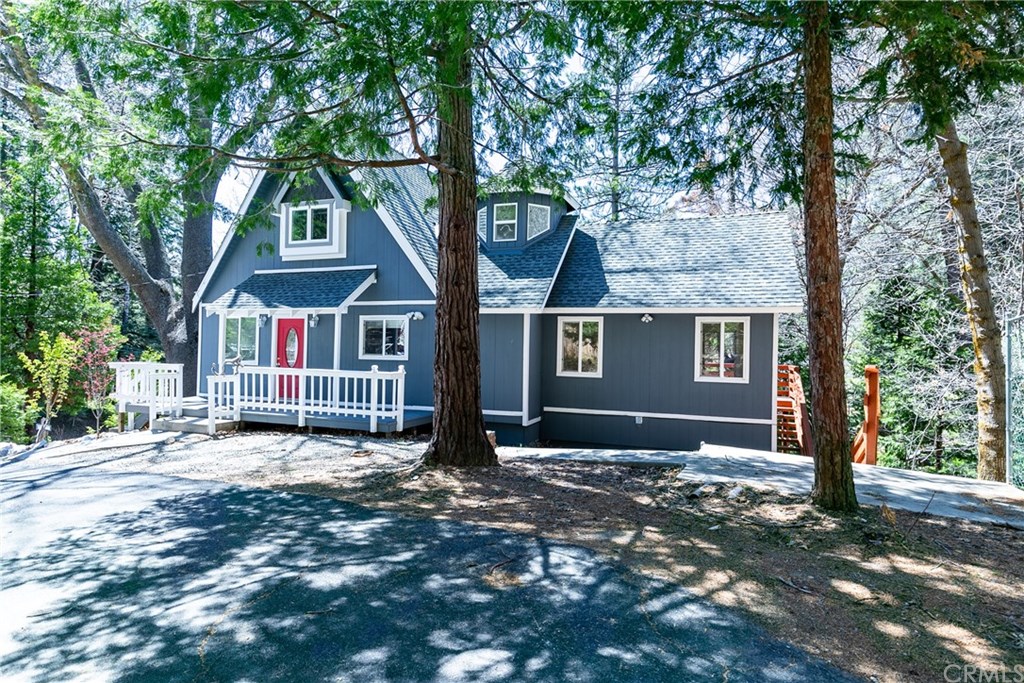 155 Golf Course Road Lake Arrowhead, CA 92352 - Photo 1 of 1 a view of a house with a tree in the forest