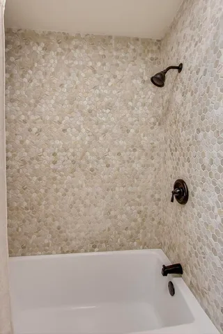 a bathroom with a bathtub