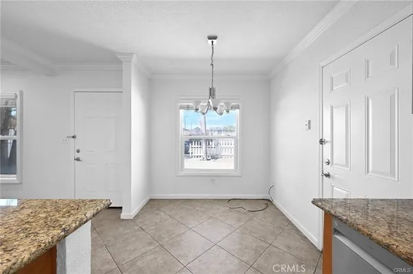a kitchen with granite countertop a sink and a granite counter tops