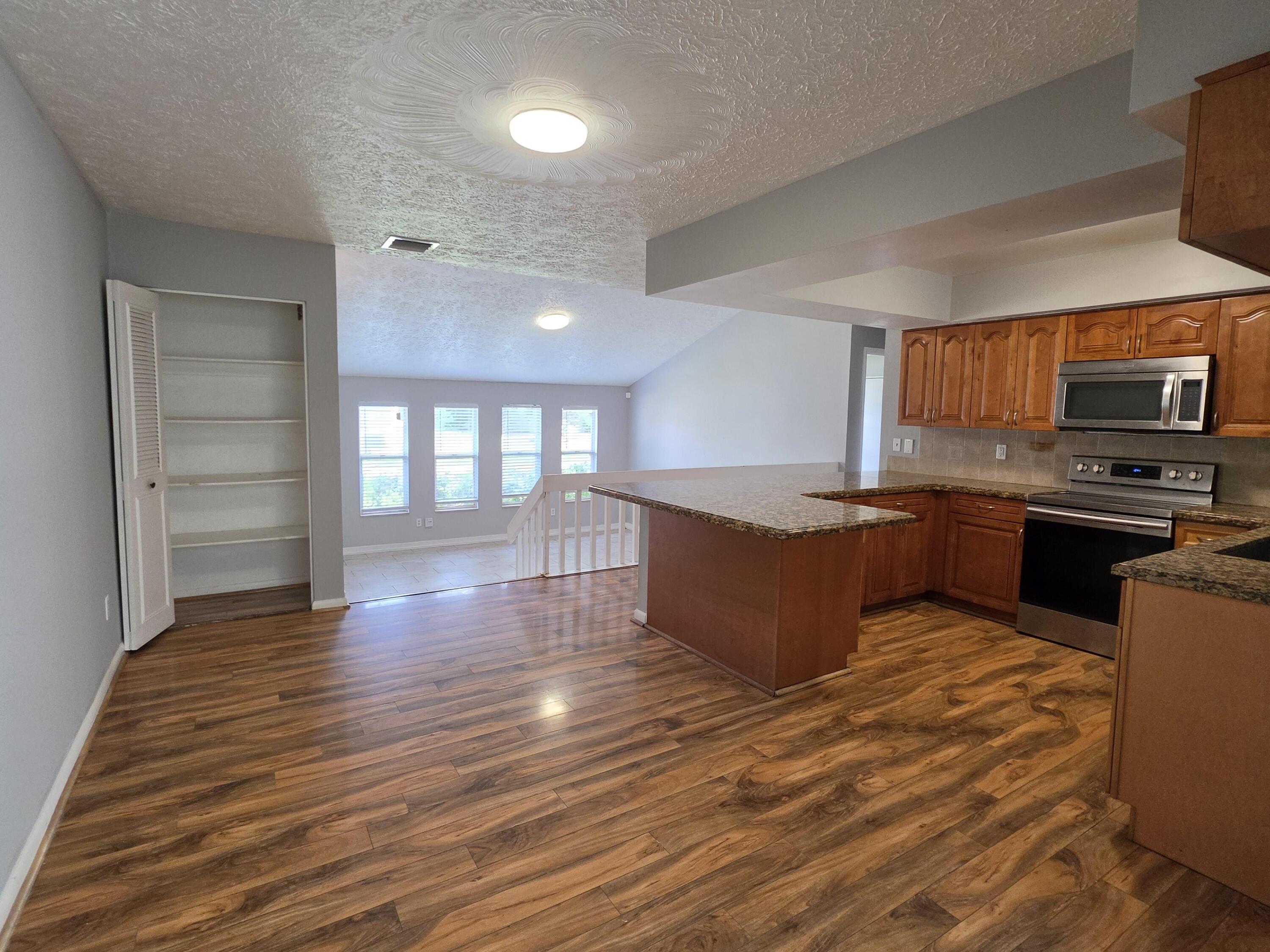 750 Southwest Monsoon Road Port St. Lucie, FL 34953 - Photo 7 of 17 Kitchen/dining