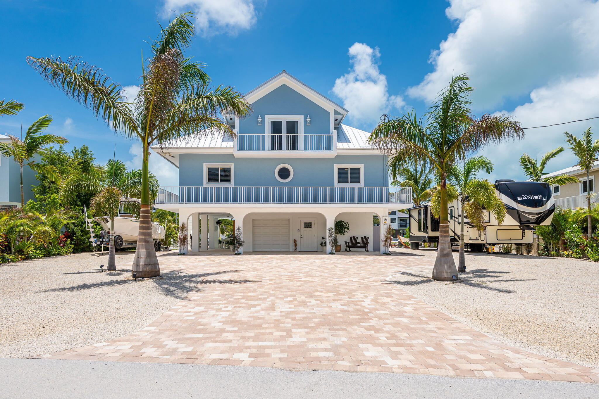 24 Mutiny Place Key Largo, FL 33037 - Photo 61 of 69 a front view of a house with a garden
