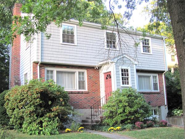 50 Clearwater Road Brookline, MA 02467 - Photo 1 of 16 front view of a house with a yard