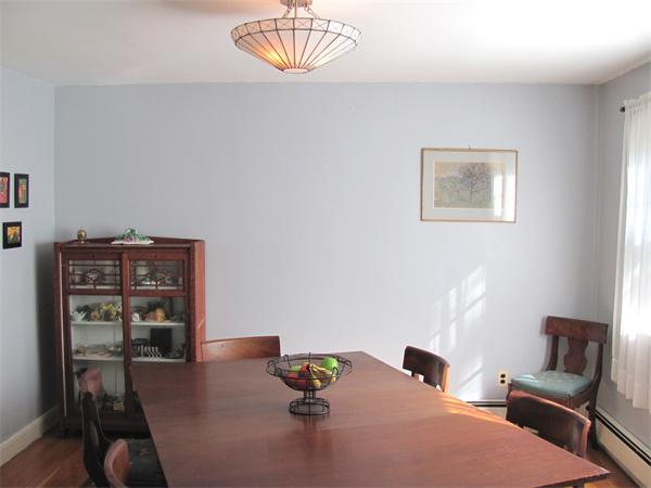 50 Clearwater Road Brookline, MA 02467 - Photo 3 of 16 a bedroom with a bed and furniture