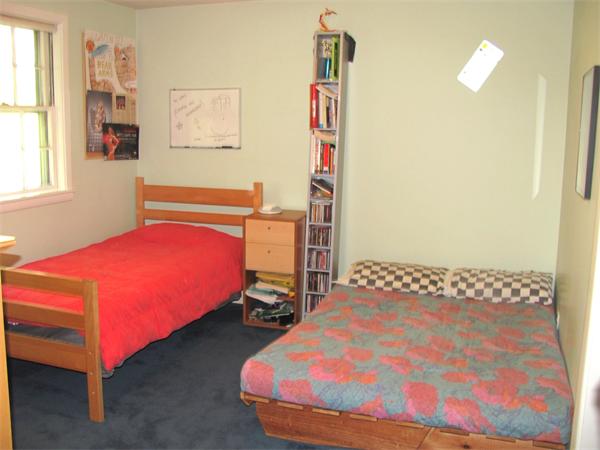 50 Clearwater Road Brookline, MA 02467 - Photo 8 of 16 a bedroom with a bed and a window