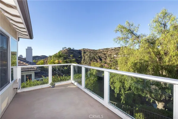 a view of a balcony with an outdoor space