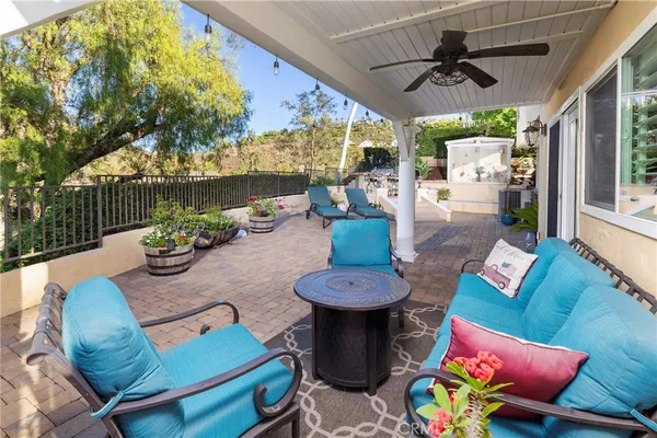 a outdoor living space with furniture and a potted plant