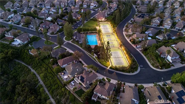 an aerial view of a highlighted house