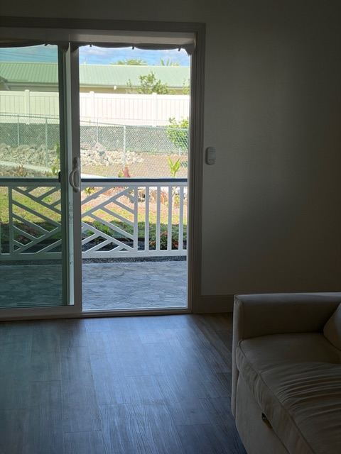 856 Ho'olala Place Hilo, HI 96720 - Photo 12 of 30 a view of room with window and wooden floor