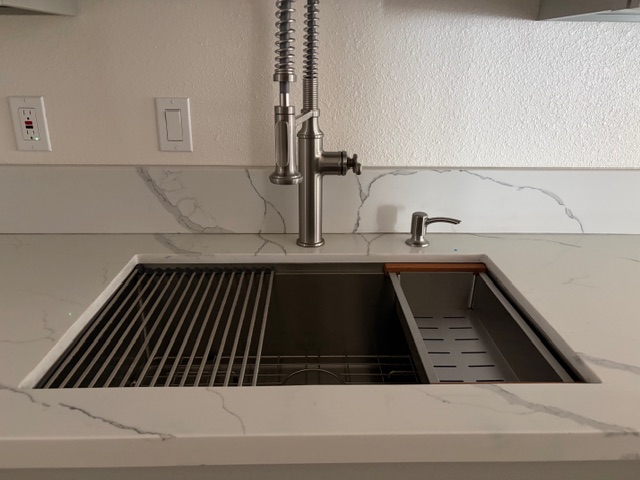 856 Ho'olala Place Hilo, HI 96720 - Photo 18 of 30 a kitchen with a sink and stove