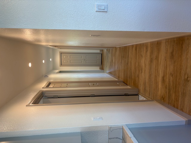 856 Ho'olala Place Hilo, HI 96720 - Photo 20 of 30 a view of a hallway with wooden floor