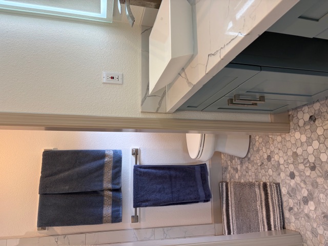 856 Ho'olala Place Hilo, HI 96720 - Photo 25 of 30 a bathroom with a sink a toilet and a mirror