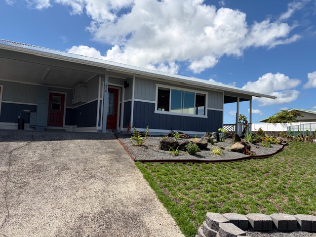 856 Ho'olala Place Hilo, HI 96720 - Photo 28 of 30 a front view of a house with garden